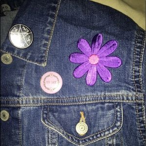 Jean jacket with patches and pins